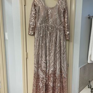 Brand new reception gown in rose gold color. Never used. Very pretty.